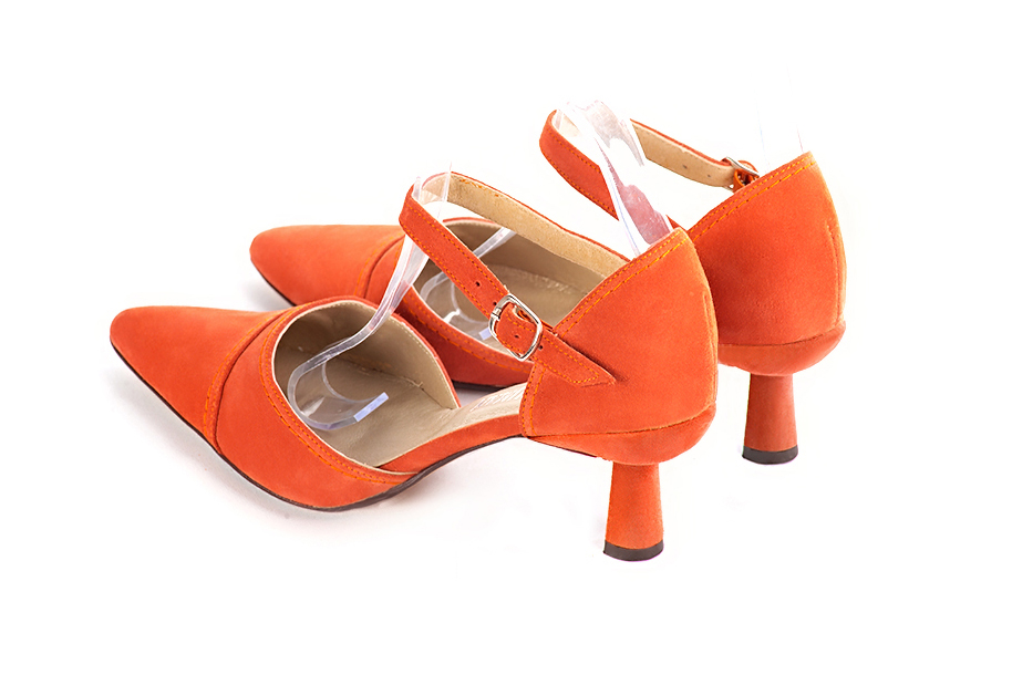 Women's clementine orange elegant closed-back heels, with an instep strap. Tapered toe. Medium spool heels - Rear view